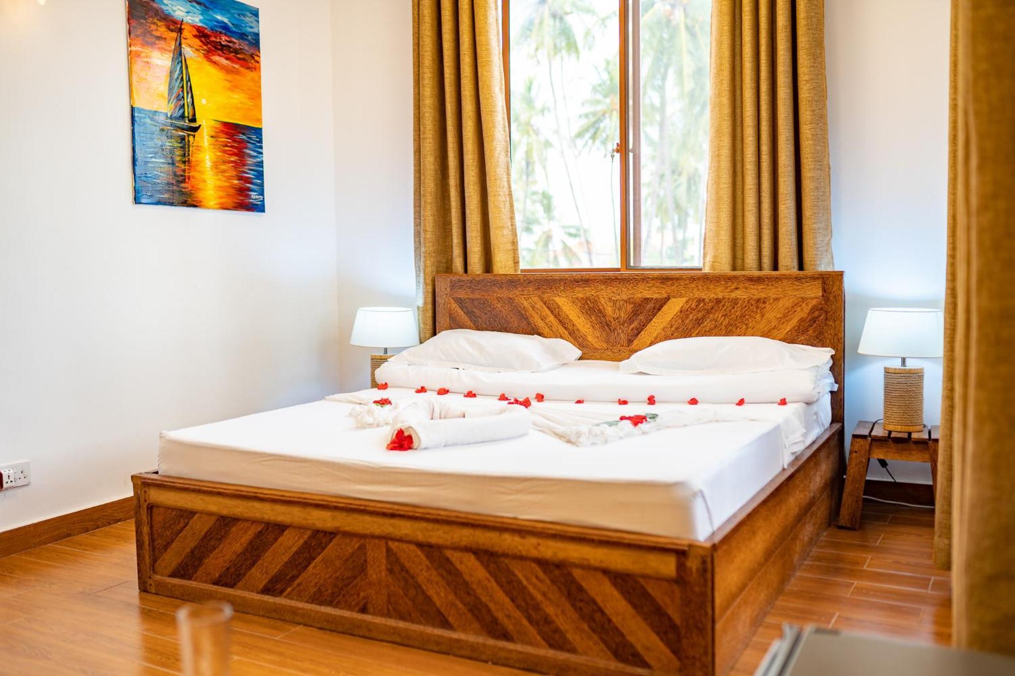 Aurora Beach Hotel Нунгви Экстерьер фото